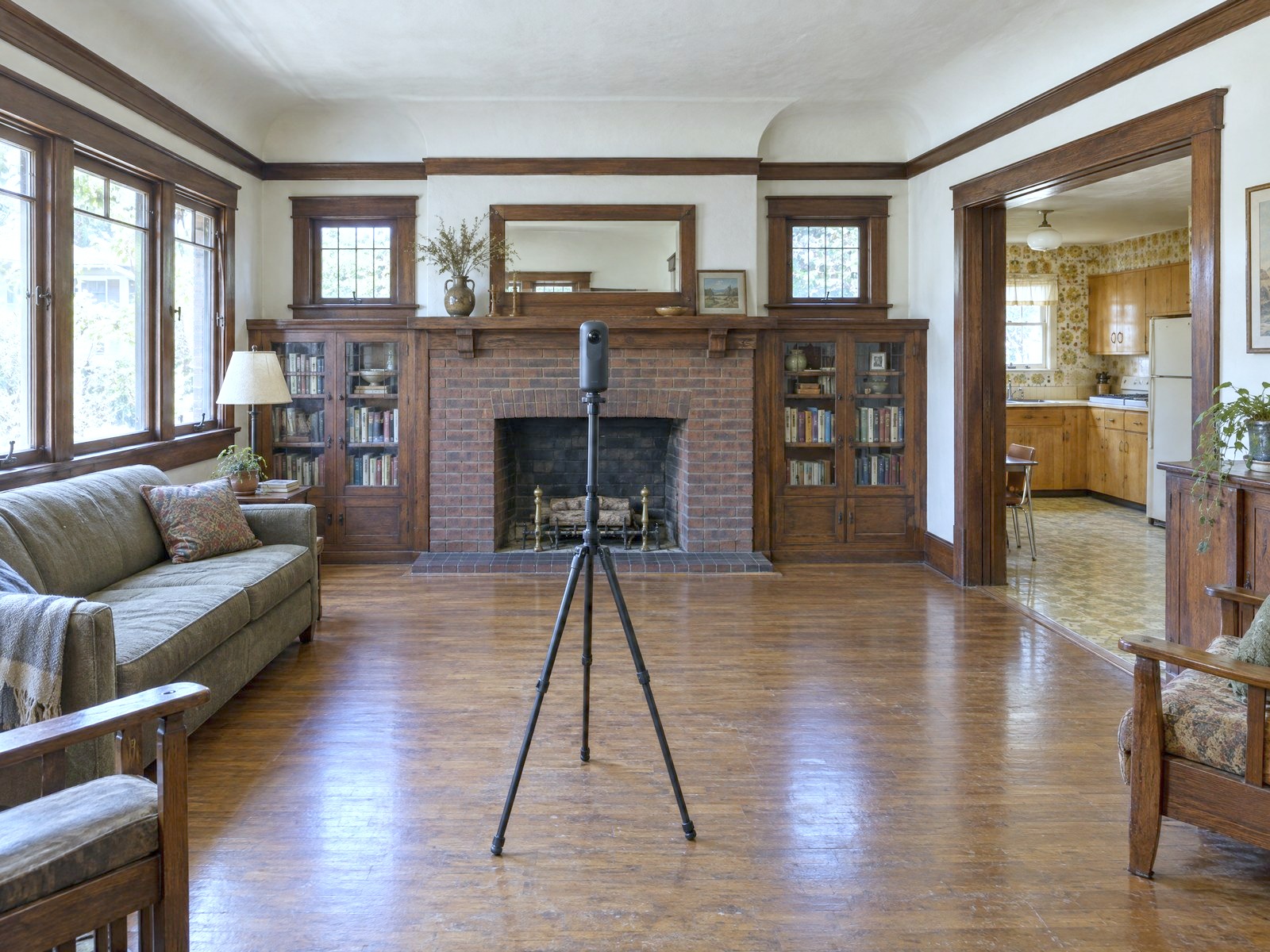 Illustration: a LiDAR scanner on its tripod in a 1920s Craftsman living room before a remodel
