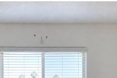 Illustration: small nail holes above a bedroom window