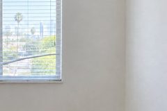 Illustration: a bent slat in a bedroom window blind